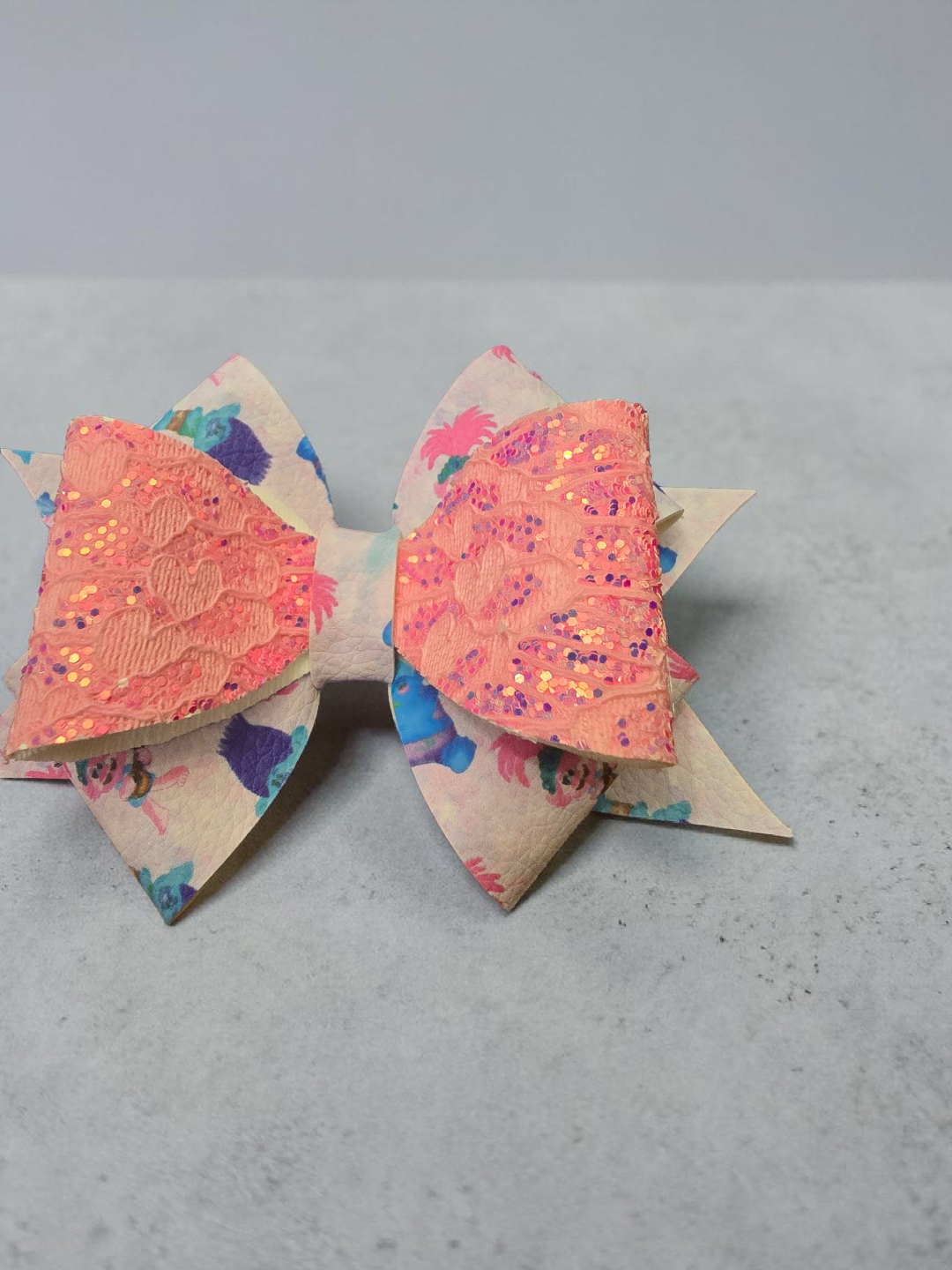 Poppy Single Hair Bow with a Pink Glitter bow